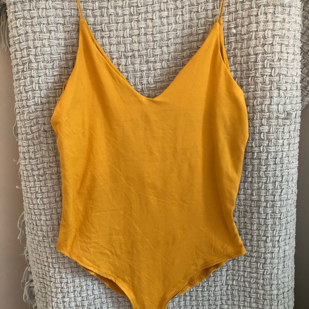 Mustard colored tank top bodysuit